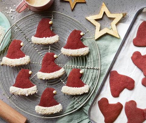 Vörös bársonyos Mikulás sapkák