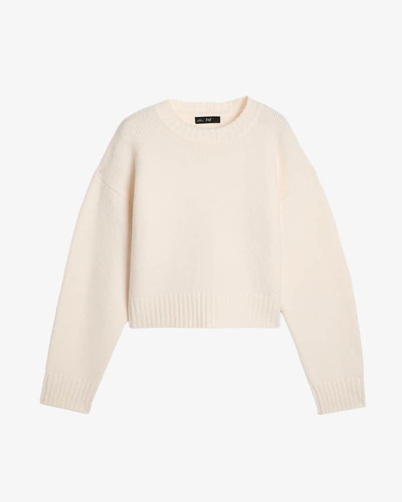 Cream cropped jumper with crew neck.