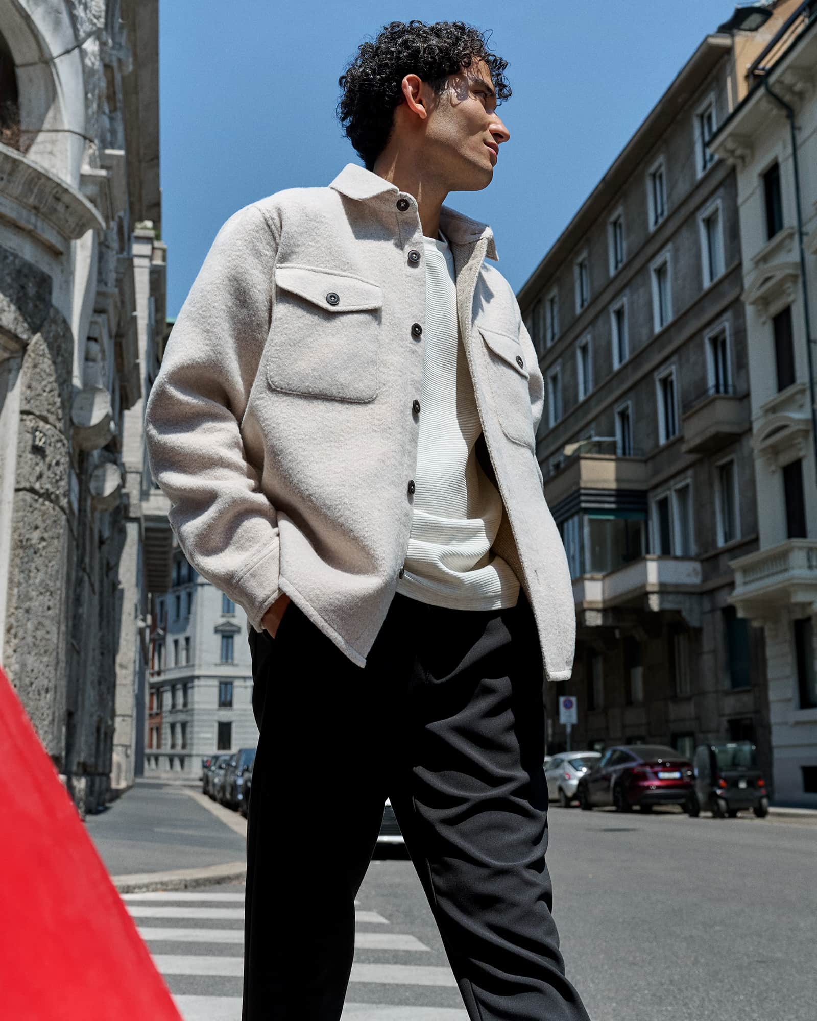Boucle button-down overshirt in cream with front chest pockets.