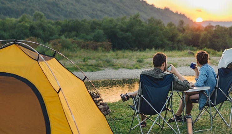 Staycation banner - talking about staycations essentials from food items, to picnicware, to things you need for  summer getaway staycations