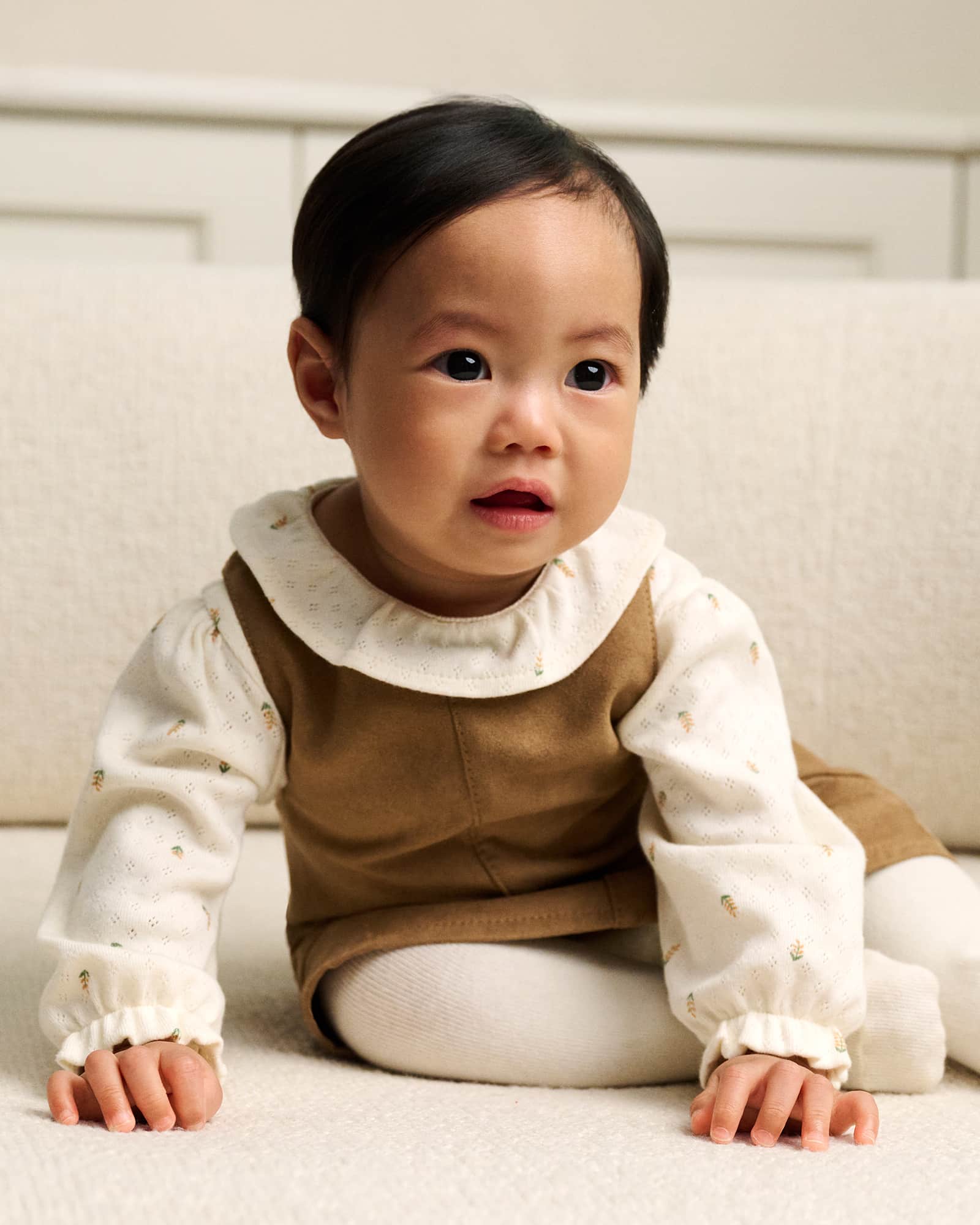 Suede brown pinafore dress.