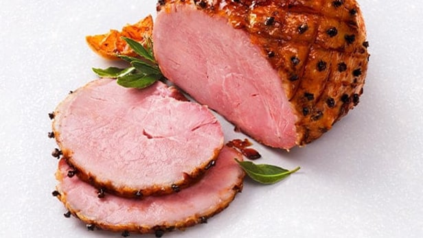 Crisp tostadas loaded with beans, avocado and a jammy poached egg