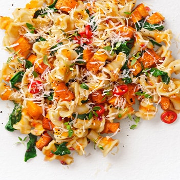 Crisp tostadas loaded with beans, avocado and a jammy poached egg