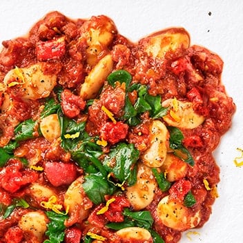 Bright and colourful, this dish is served with garlic bread