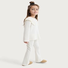 F&F Girls 2-Piece Textured Ruffle Top and Flared Leggings Set in Cream