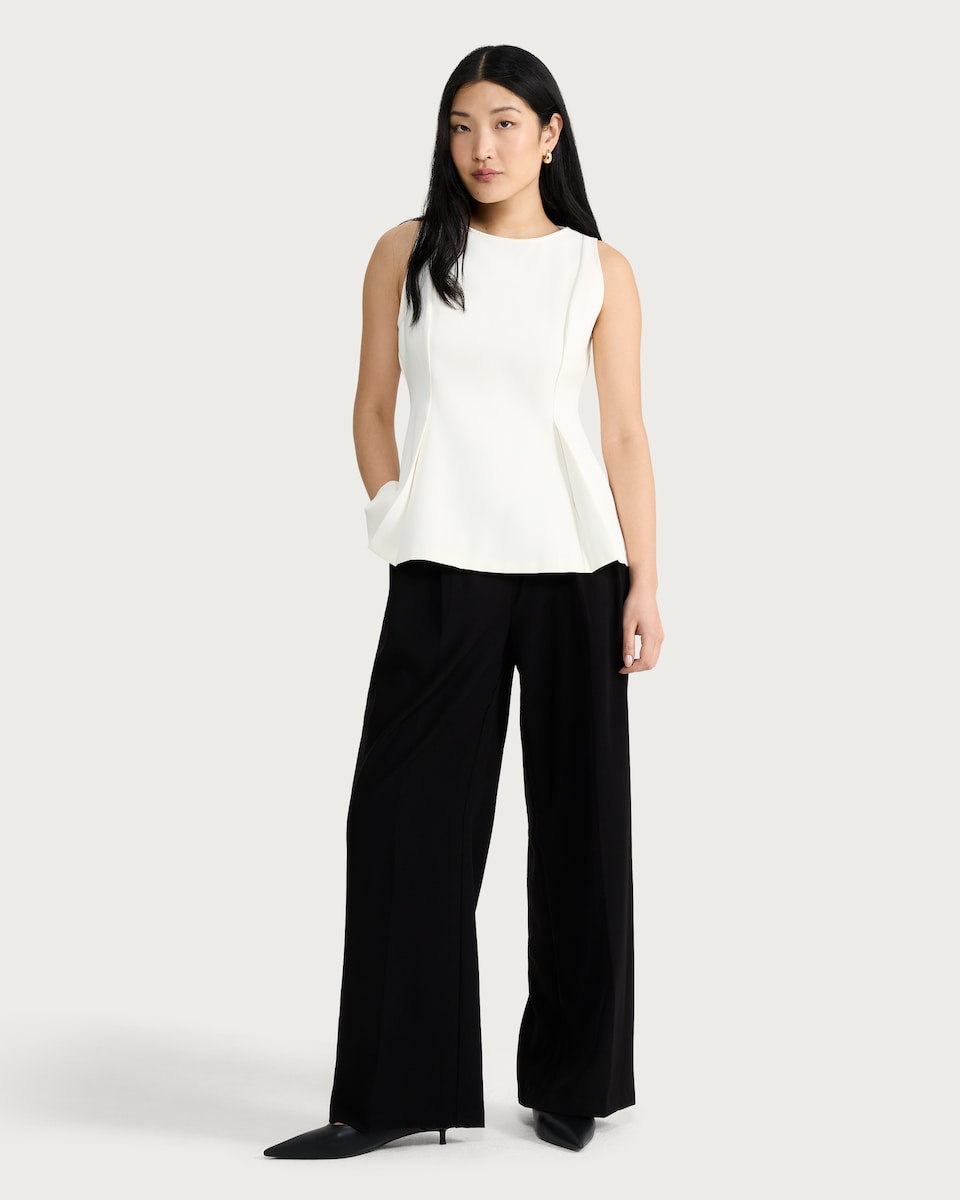 image 1 of F&F Sleeveless Peplum Top in Cream