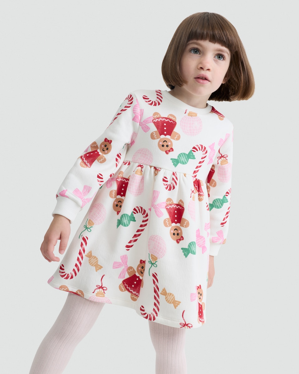 image 1 of F&F Girls Cotton Rich Gingerbread and Candy Print Sweat Dress in Cream