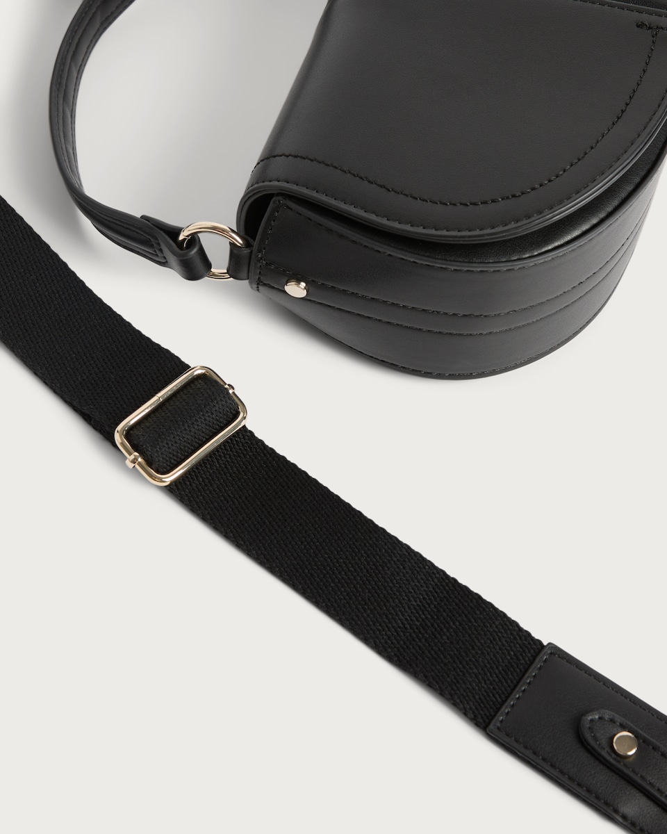 image 1 of SACHA Smooth Saddle Crossbody Bag in Black