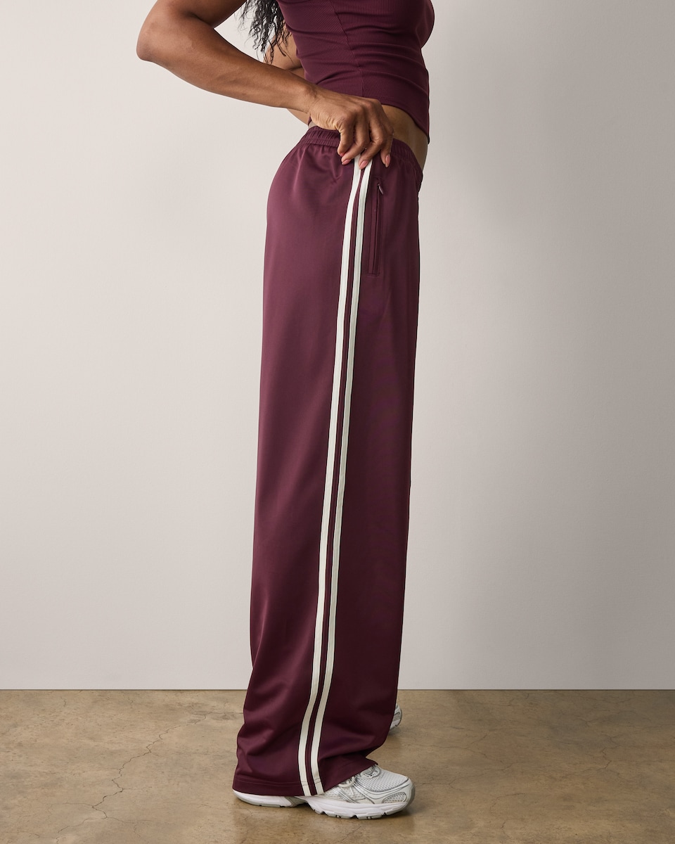 image 1 of F&F Active AFTERCLASS Side Stripe Wide Leg Joggers in Burgundy