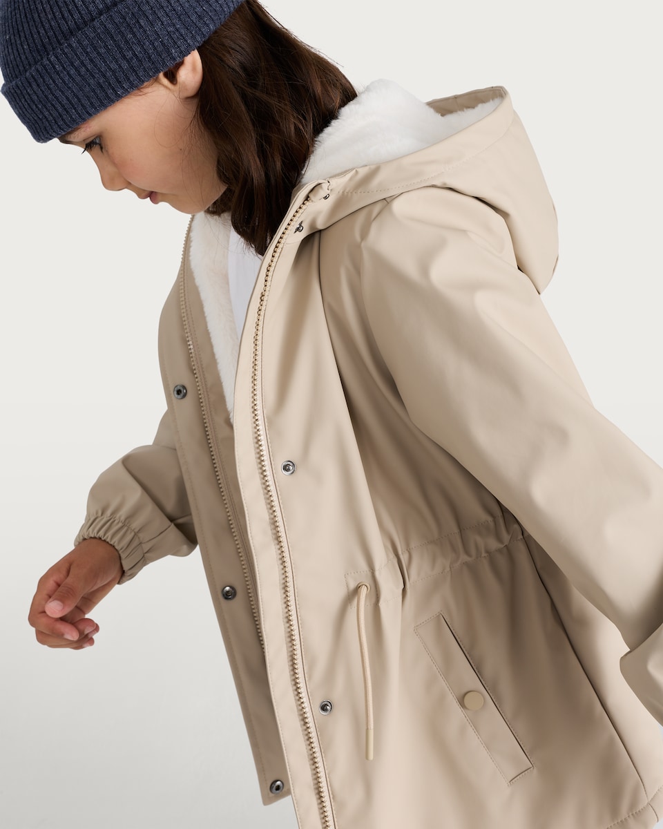 image 1 of F&F Girls Rubber Hooded Zip Through Parka in Cream