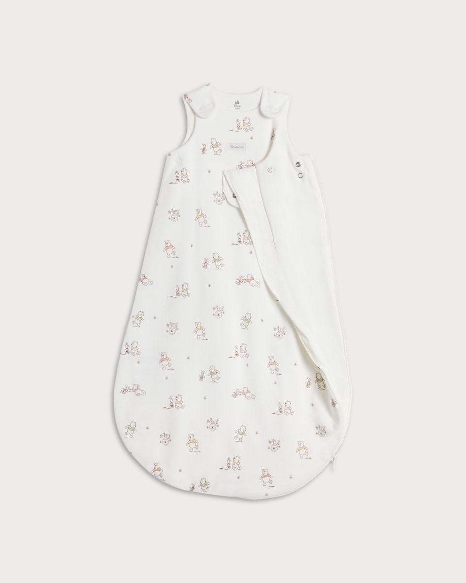 image 1 of Disney Winnie the Pooh Print Pure Cotton 1.5 Tog Sleeping Bag in White