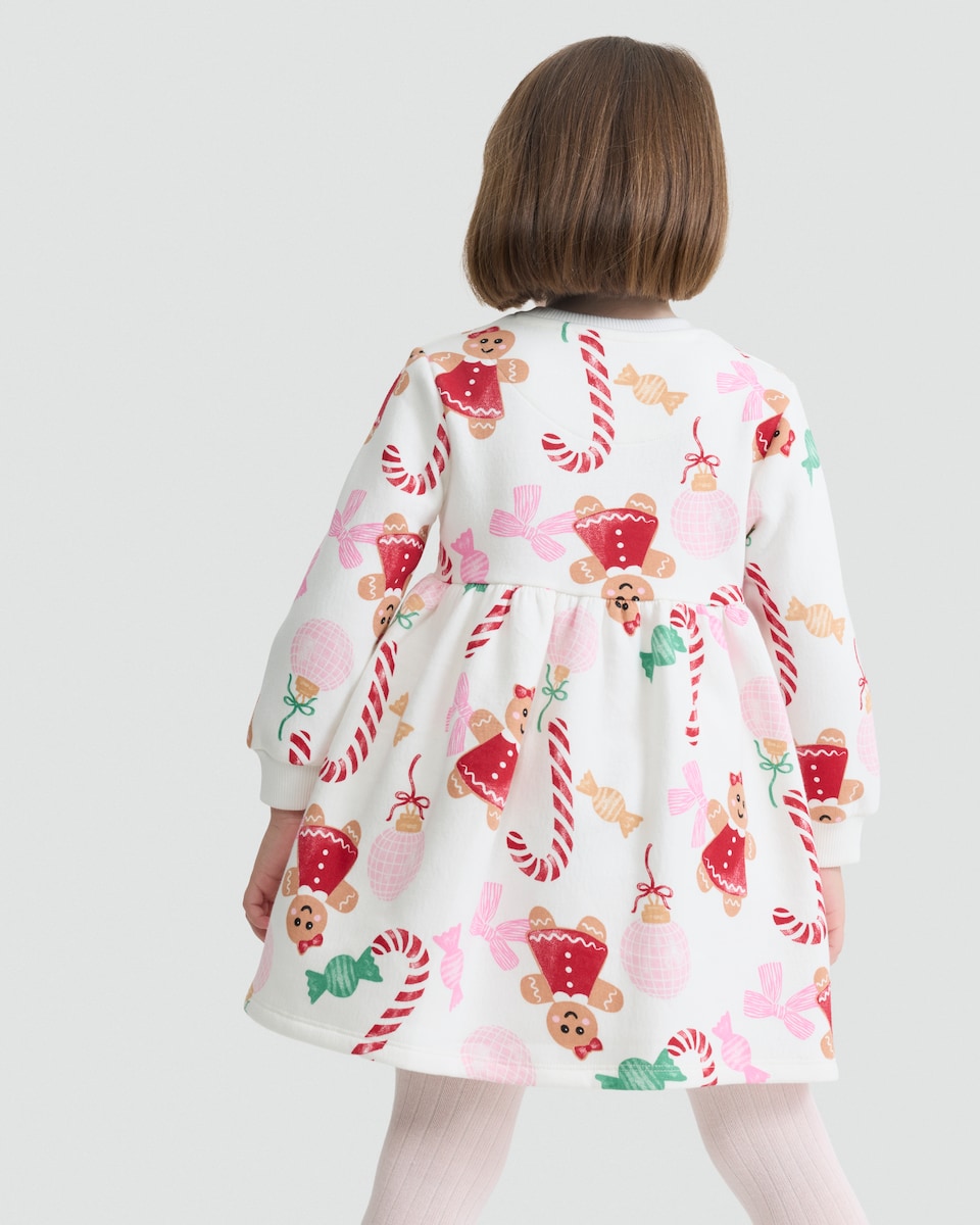 image 1 of F&F Girls Cotton Rich Gingerbread and Candy Print Sweat Dress in Cream