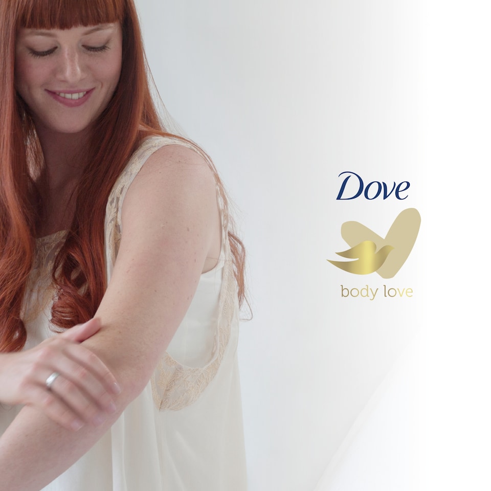 image 1 of Dove Silky Body Cream Pot 300Ml