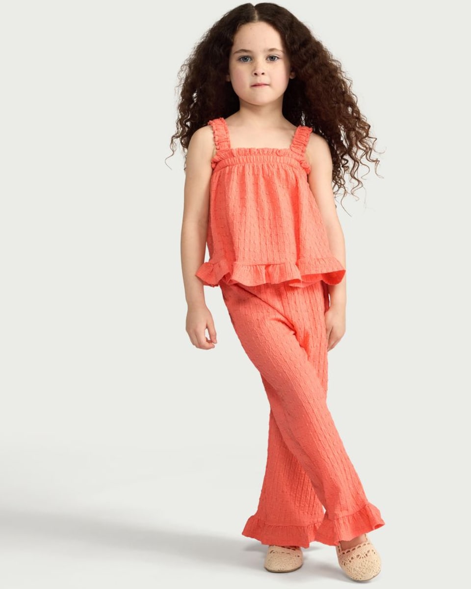 image 1 of F&F Girls 2-Piece Textured Frill Trim Top and Trousers Set in Coral