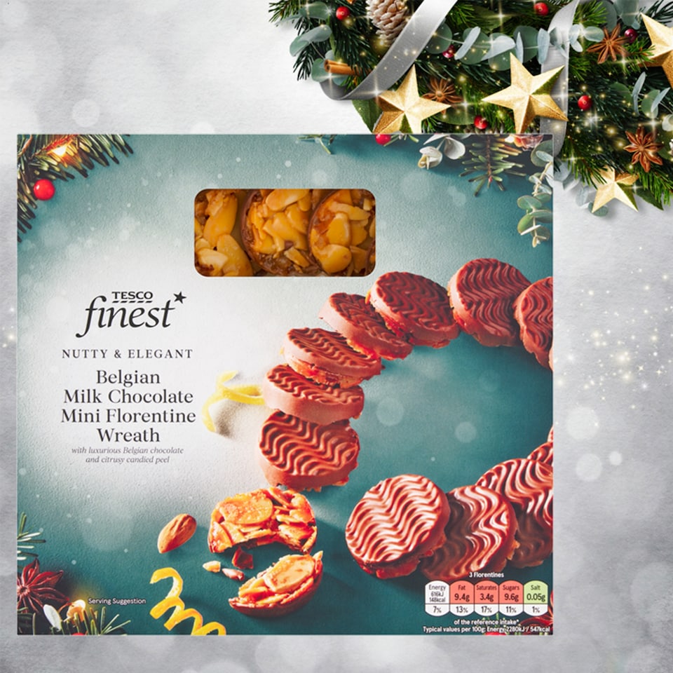 Obrázek 1 pro produkt Tesco Finest Florentýnky karamelová kolečka s mandlemi, proslazenou citrusovou kůrou v čokoládě 135g