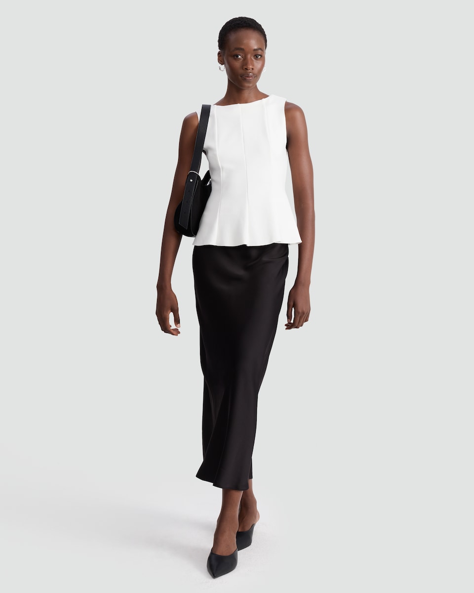 image 1 of F&F Pleated Sleeveless Peplum Top in Cream