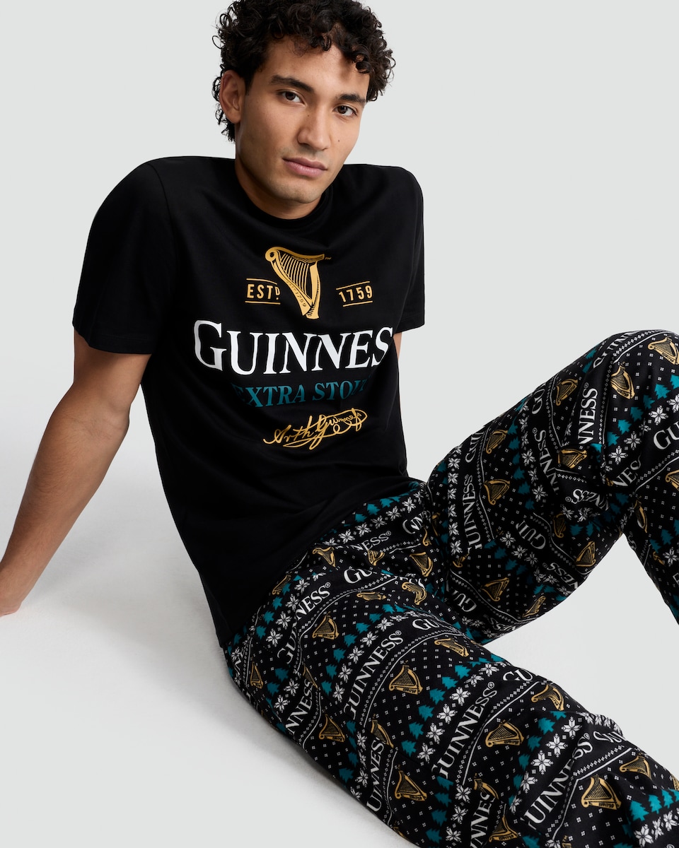 image 1 of Guinness Extra Stout Print T-Shirt and Bottoms Pyjamas in Black