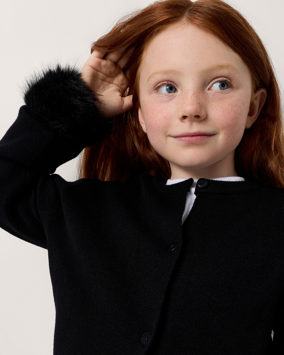 image 1 of F&F Girls Faux Fur Cuff Cardigan in Black