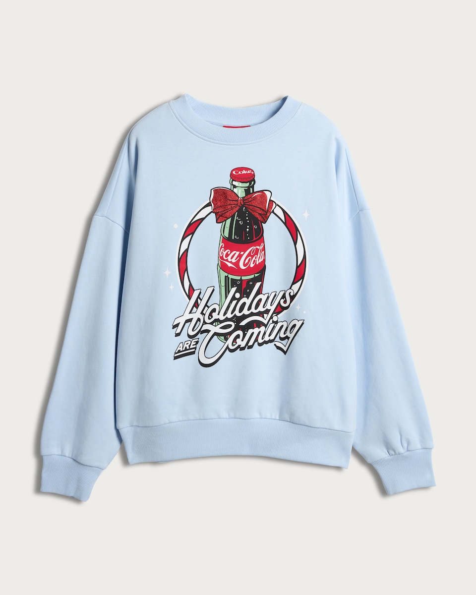 image 1 of Coca-Cola Holidays Are Coming Cotton Rich Slogan Sweatshirt in Blue