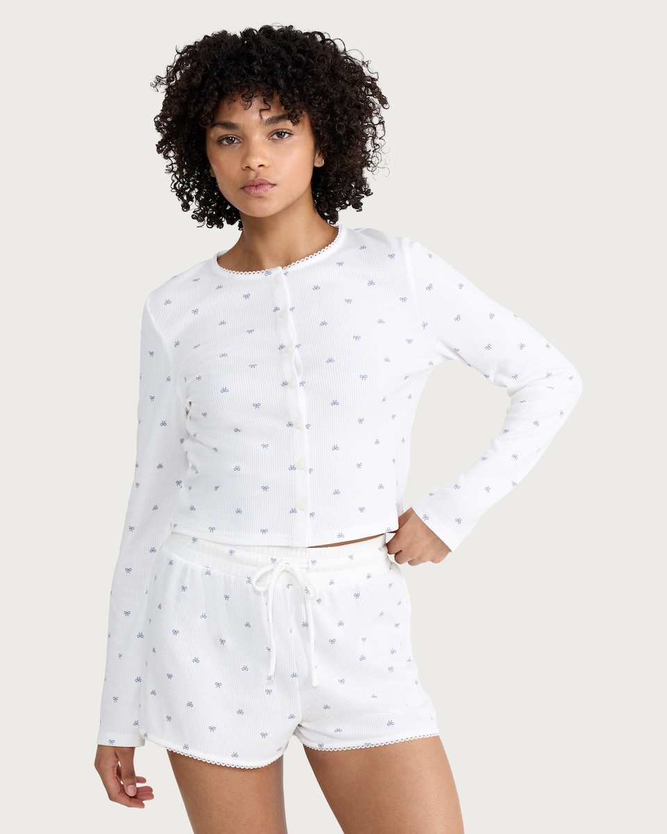image 1 of OH ME OH MY Ribbed Bow Print Button Up Pyjama Cardigan in White