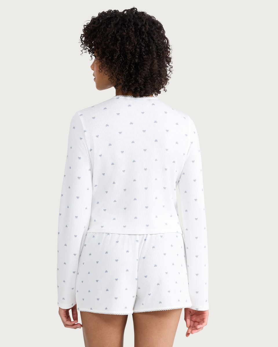 image 1 of OH ME OH MY Ribbed Bow Print Button Up Pyjama Cardigan in White