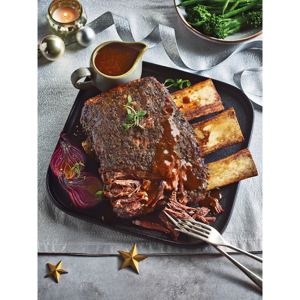 image 1 of 42. Tesco Finest Slow Cooked Beef Rib with a Red Wine and Roasted Garlic Gravy 1.584kg (Serves 6)