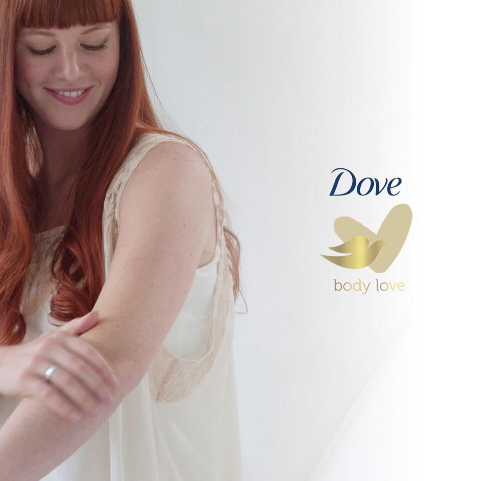 image 1 of Dove Silky Body Cream Pot 300Ml