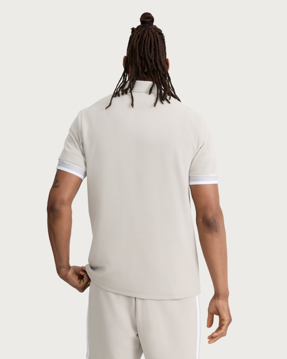 image 1 of F&F Textured Zip Neck Short Sleeved Polo Shirt in Stone