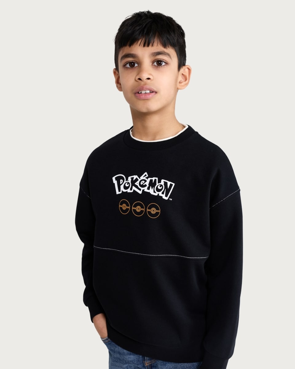 image 1 of Pokémon Cotton Rich Poké Ball Sweatshirt in Black