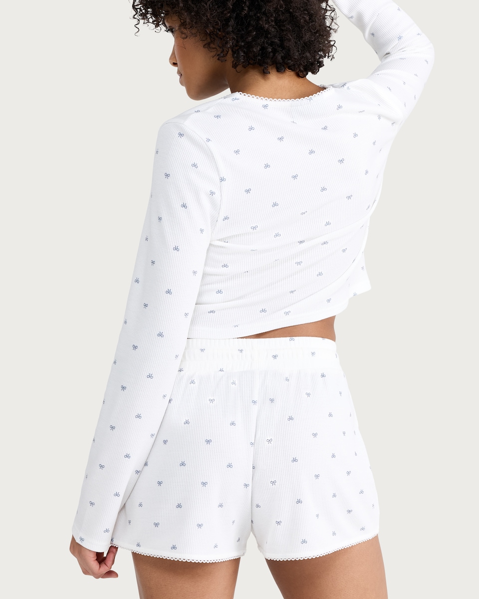 image 1 of OH ME OH MY Ribbed Bow Print Pyjama Shorts in White