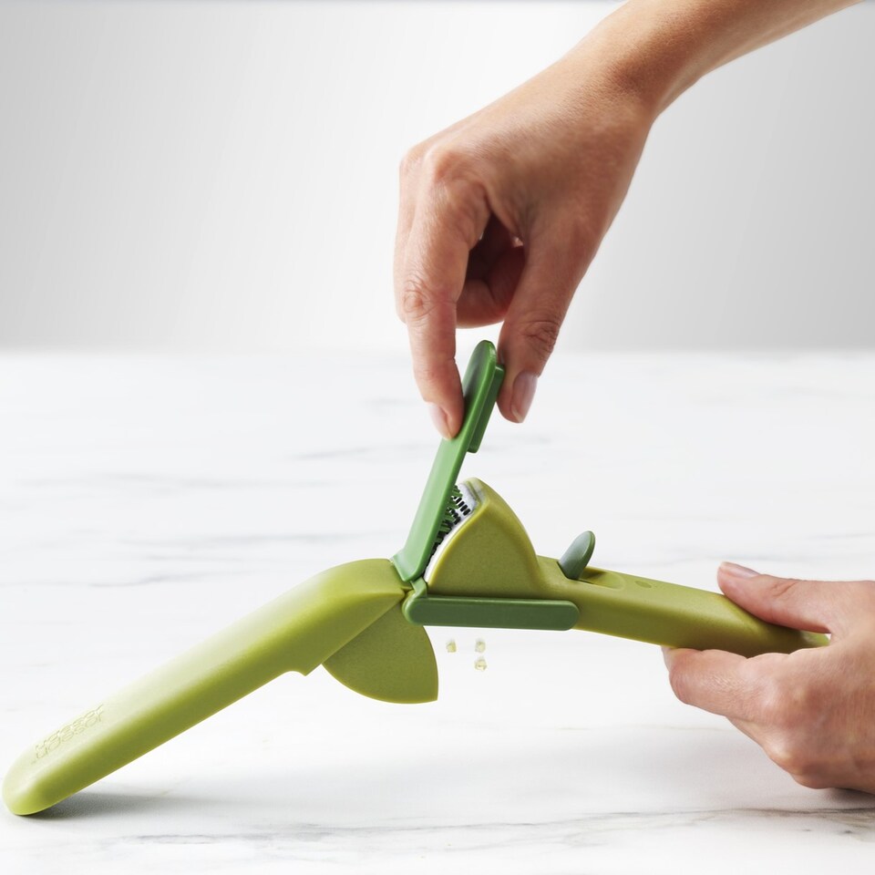 image 1 of Joseph Joseph Duo Easy Clean Garlic Press Green