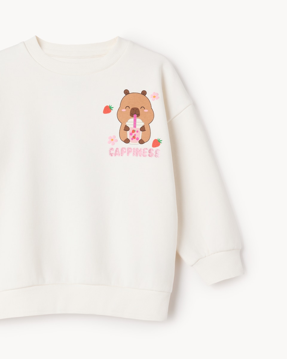 image 1 of Capyfun Cotton Rich Capybara Sweatshirt in Cream