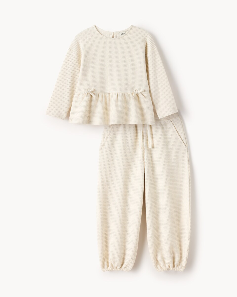 image 1 of F&F Girls Cotton Rich Sparkly Peplum Top and Joggers Set in Cream