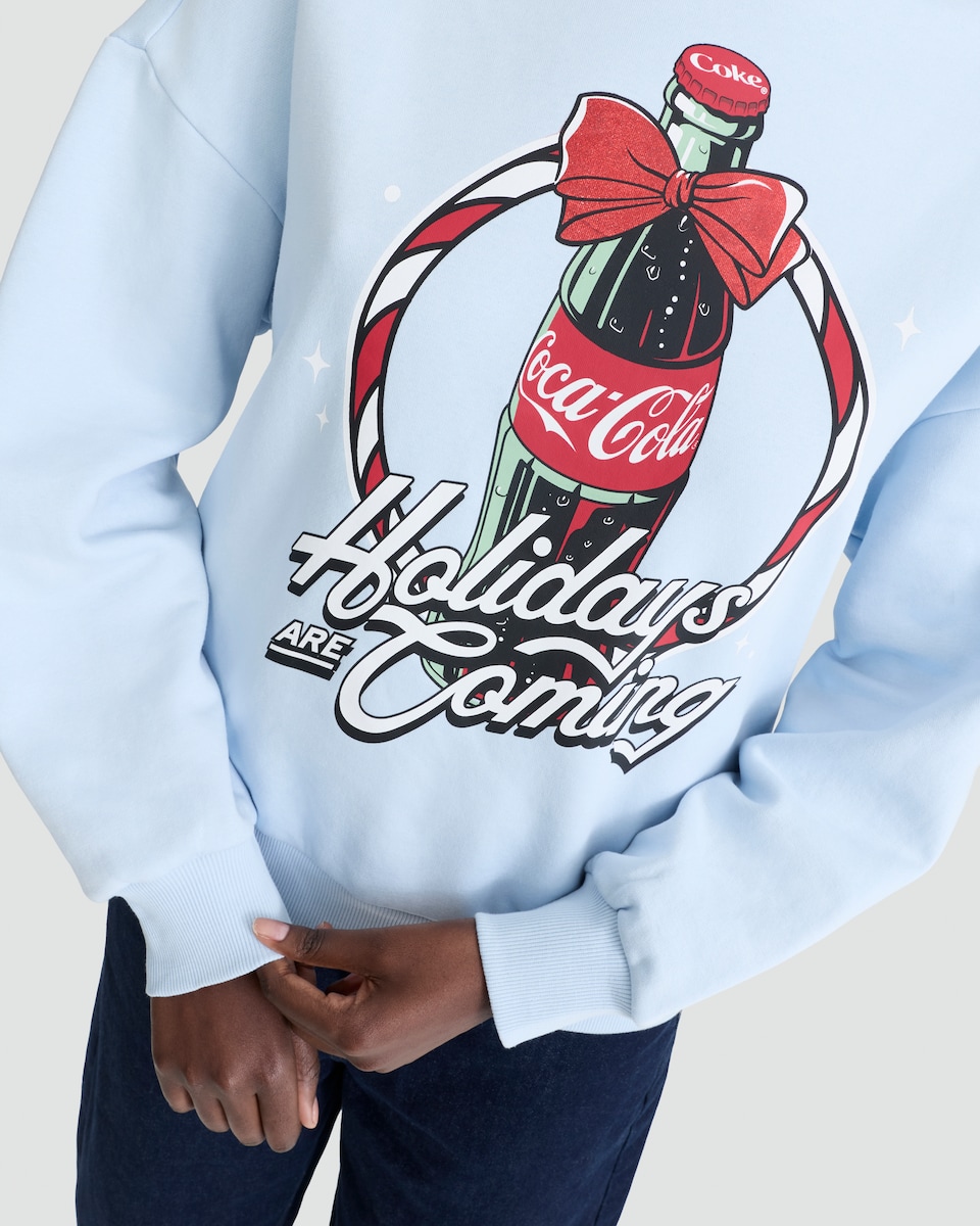 image 1 of Coca-Cola Holidays Are Coming Cotton Rich Slogan Sweatshirt in Blue