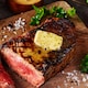 image 2 of Tesco Finest Butter with Truffle Flavoured Olive Oil, Black Pepper, Garlic & Onion 90g 