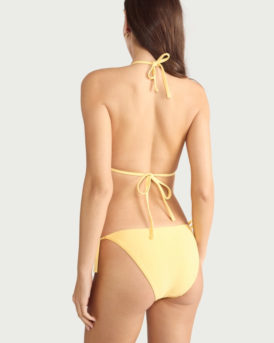 image 1 of F&F Tie Side Bikini Bottoms in Yellow