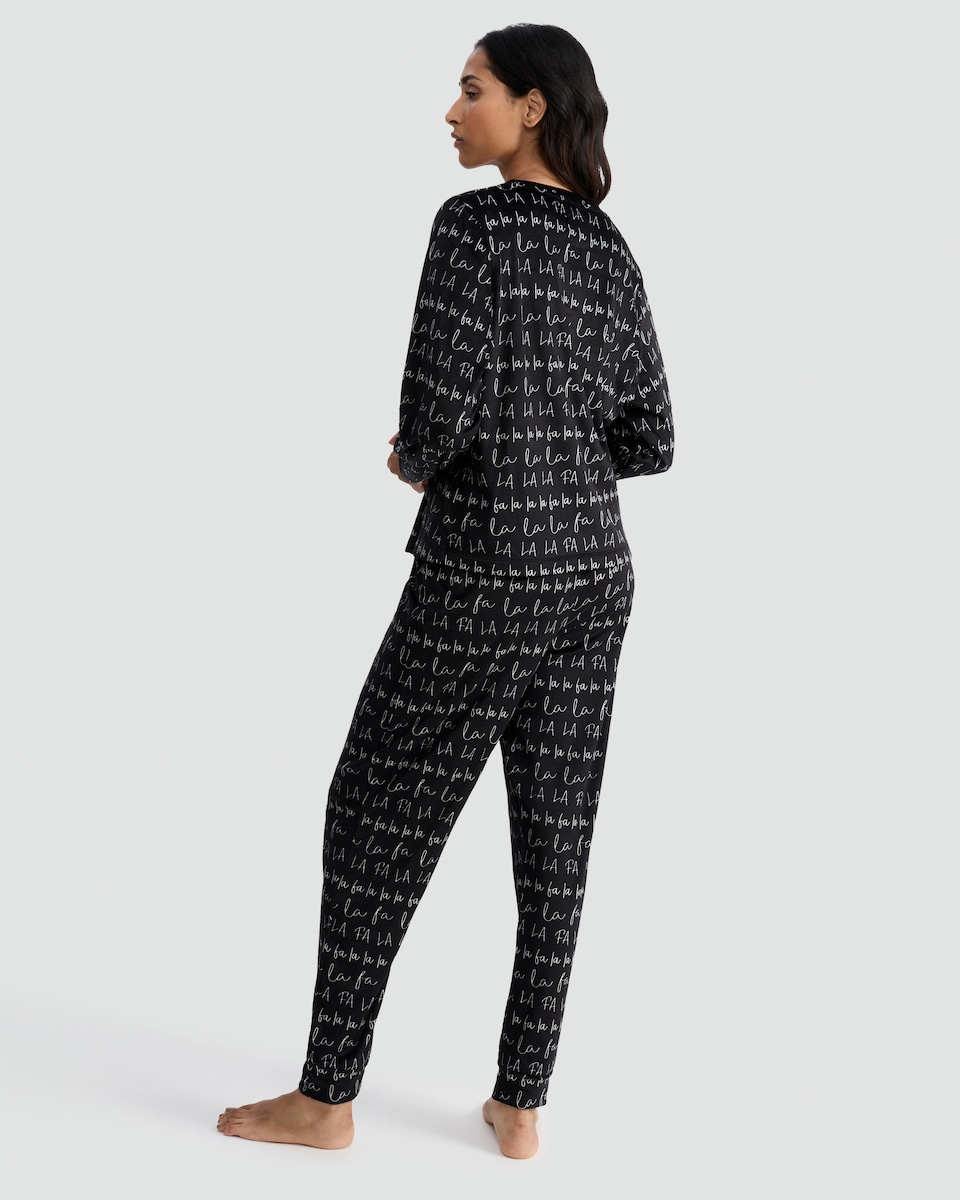 image 1 of F&F Fleece La La La Print Top and Bottoms Pyjamas in Black