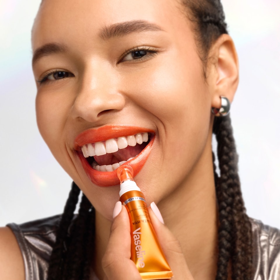 image 1 of Vaseline Gluta-HYA Serum Gloss Tinted Lip Care Juicy Peach 10ml