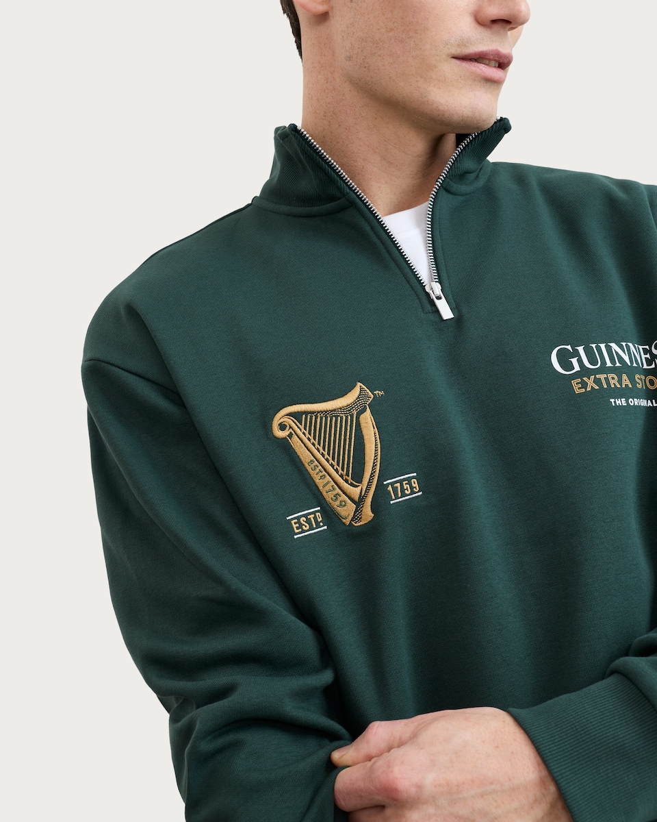 image 1 of Guinness Extra Stout Cotton Rich Embroidered Half Zip Sweatshirt in Green