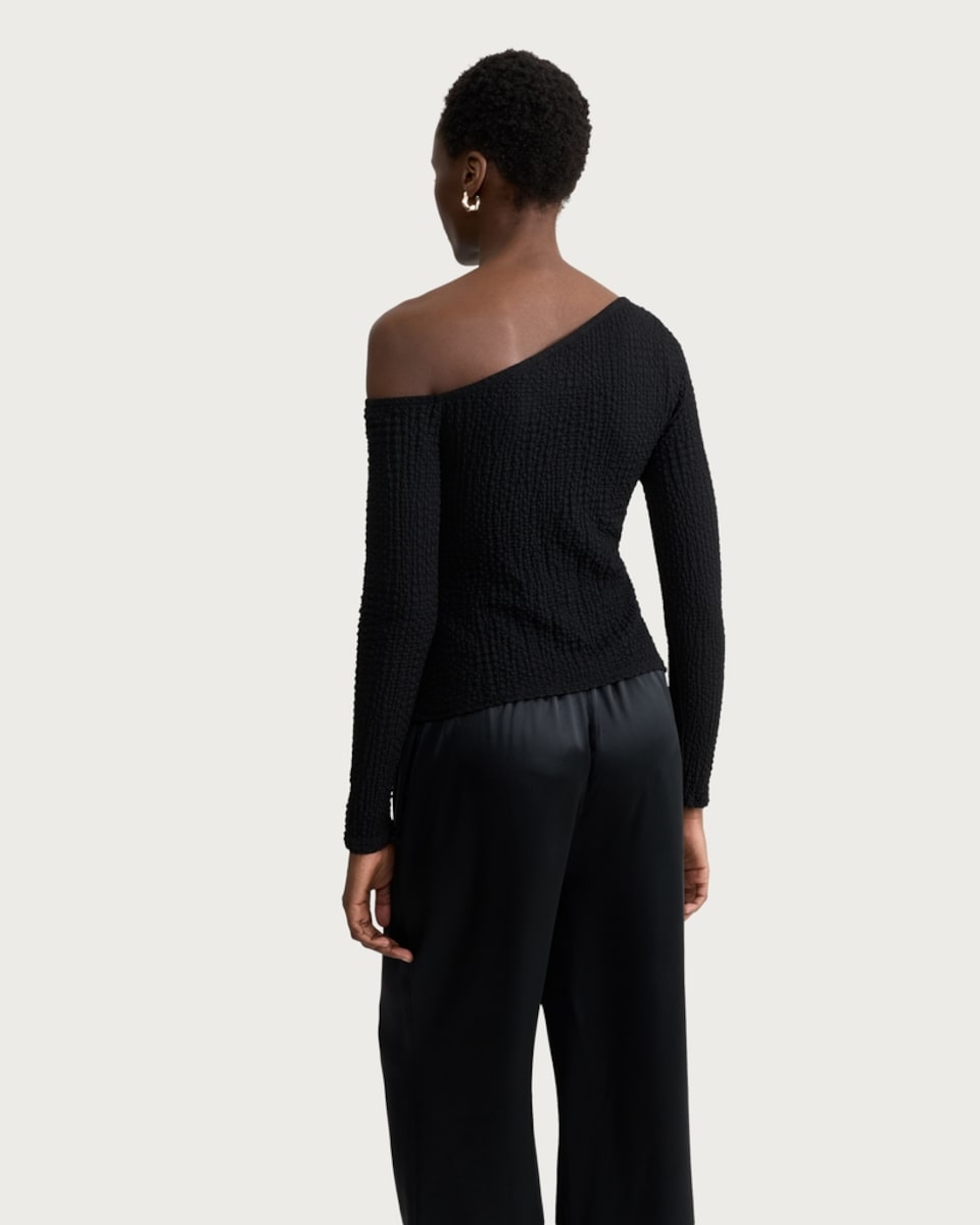 image 1 of F&F Textured Gold Buckle Asymmetric Hem Top in Black