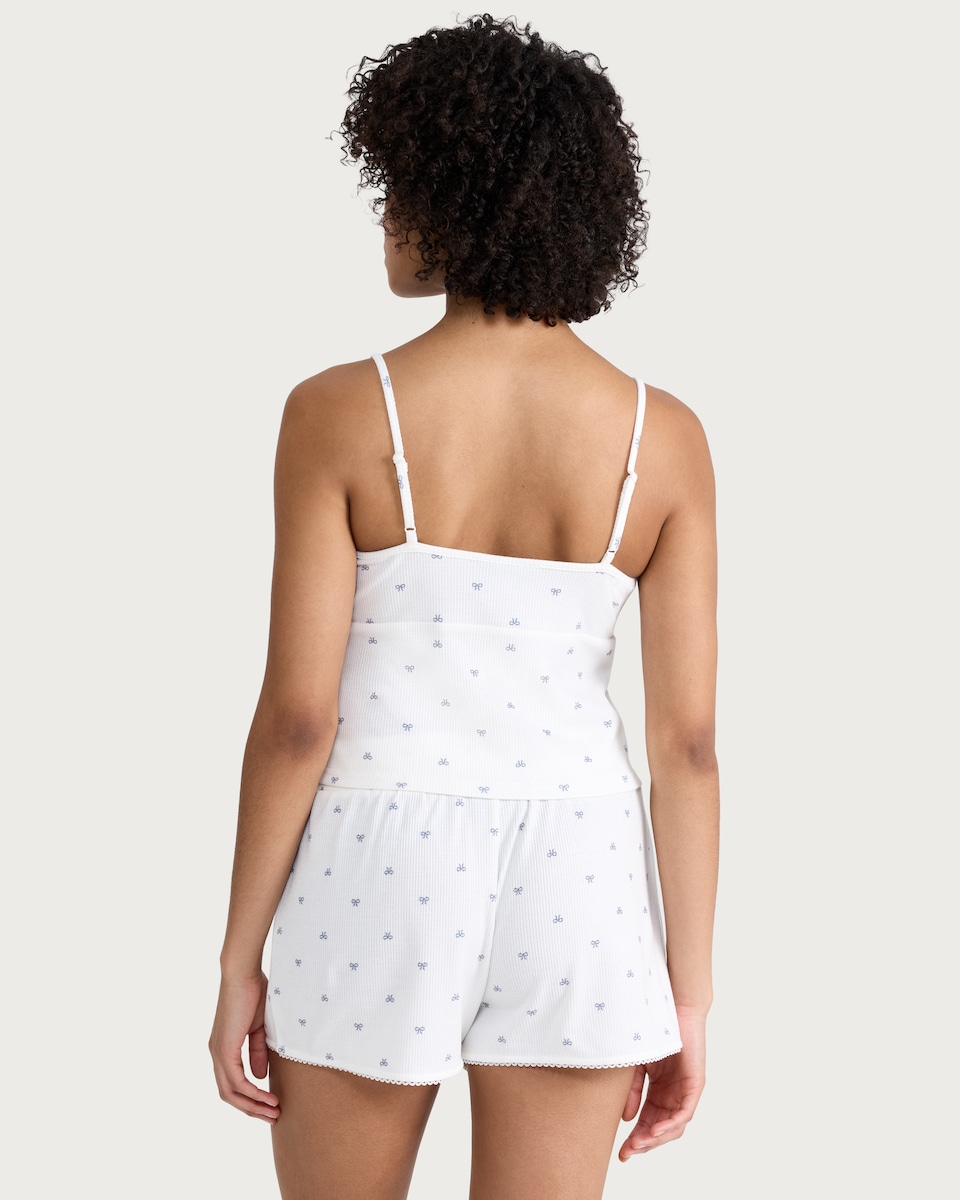 image 1 of OH ME OH MY Ribbed Bow Print Pyjama Vest in White