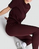 image 1 of F&F Medium Warmth Faux Fur Lined Leggings in Burgundy