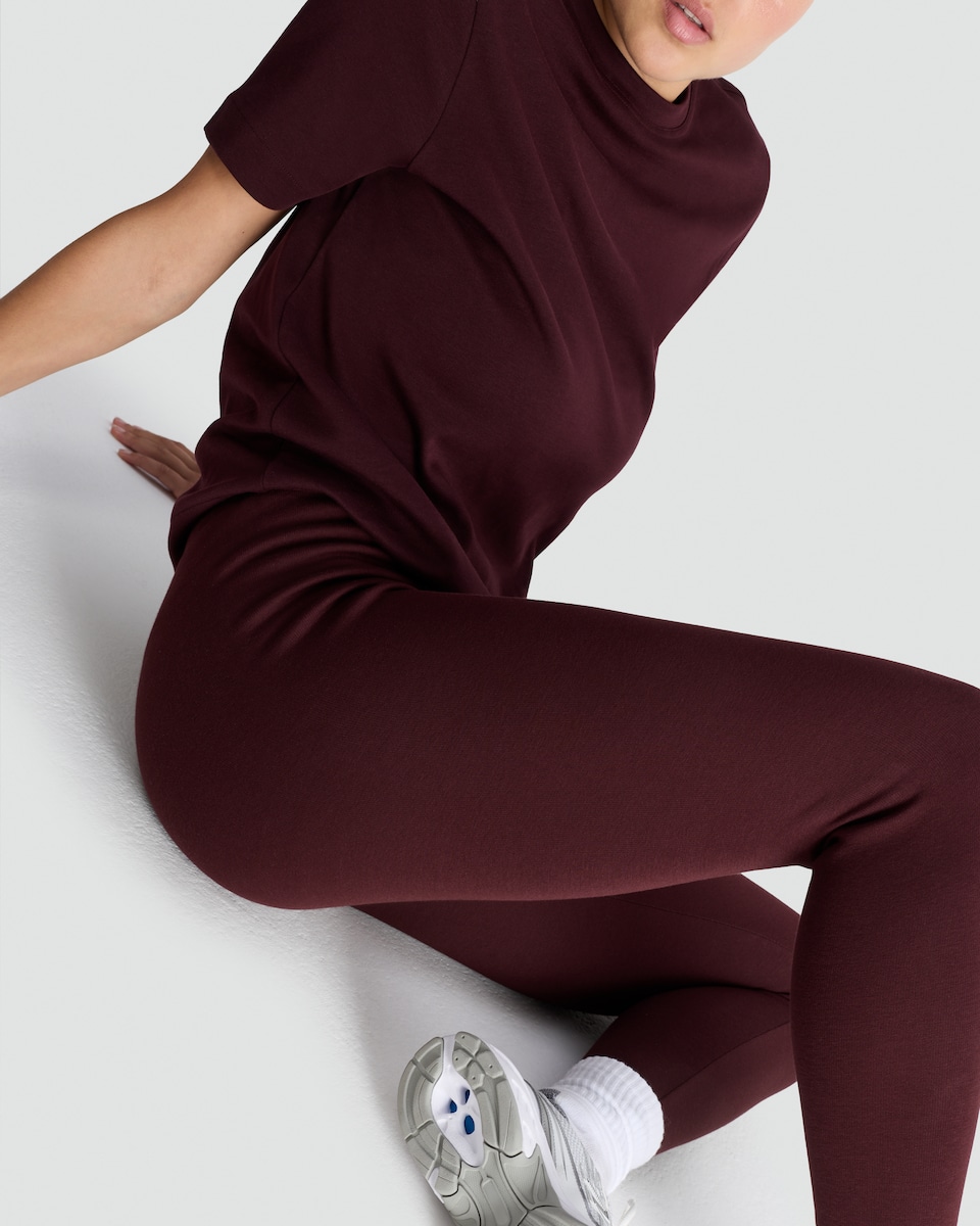 image 1 of F&F Medium Warmth Faux Fur Lined Leggings in Burgundy