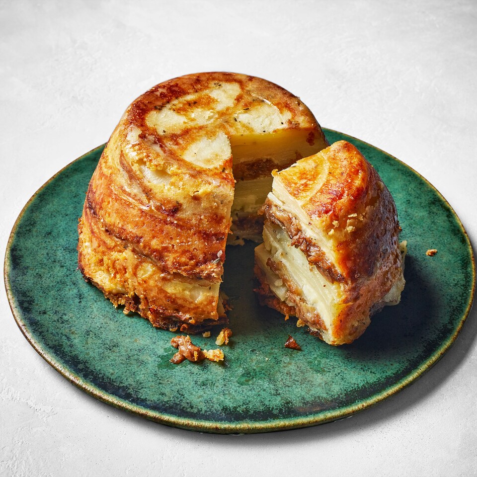 62. Tesco Finest Chef’s Collection Potato & Three Cheese Pavé with Caramelised Onions 620g (Serves 4)