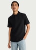 image 1 of F&F Cotton Rich Textured Short Sleeved Polo Shirt in Black