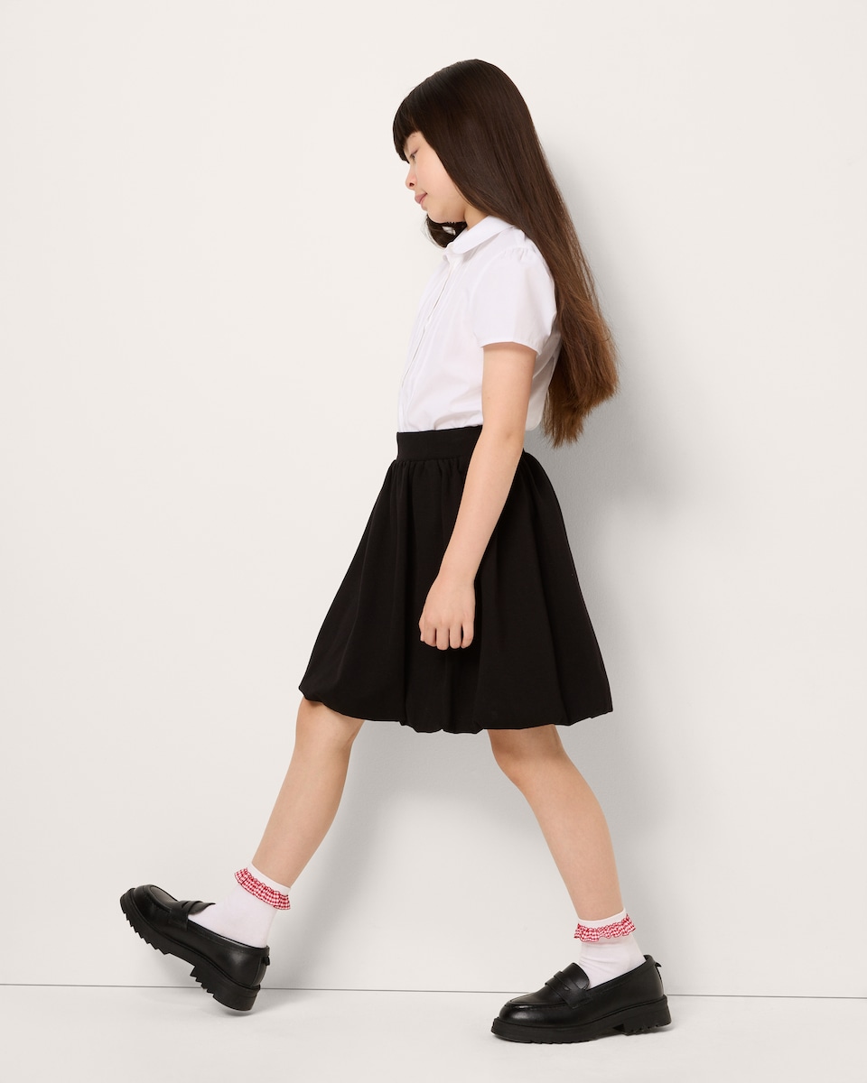 image 1 of F&F School Girls Puffball Skirt in Black