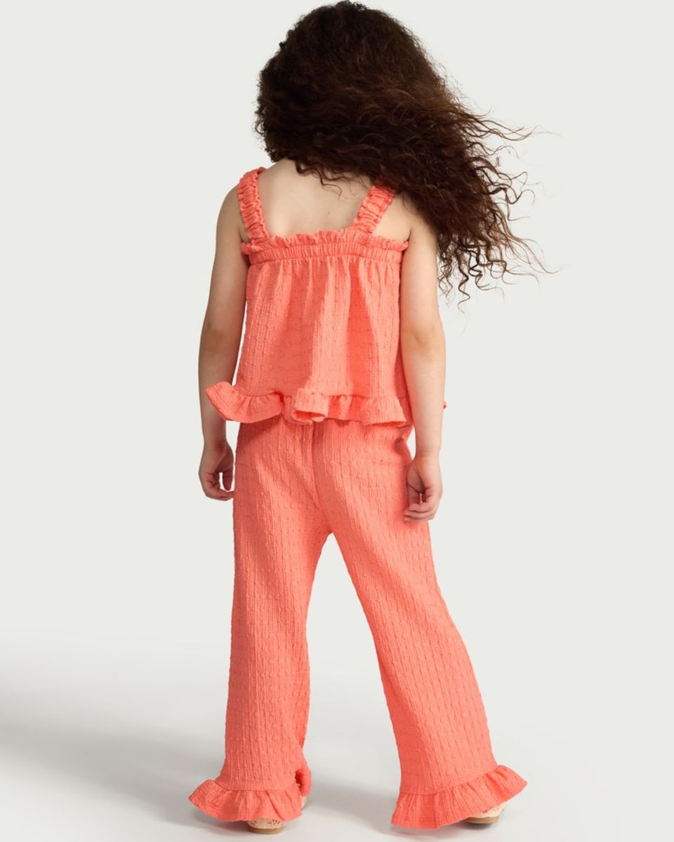 image 1 of F&F Girls 2-Piece Textured Frill Trim Top and Trousers Set in Coral