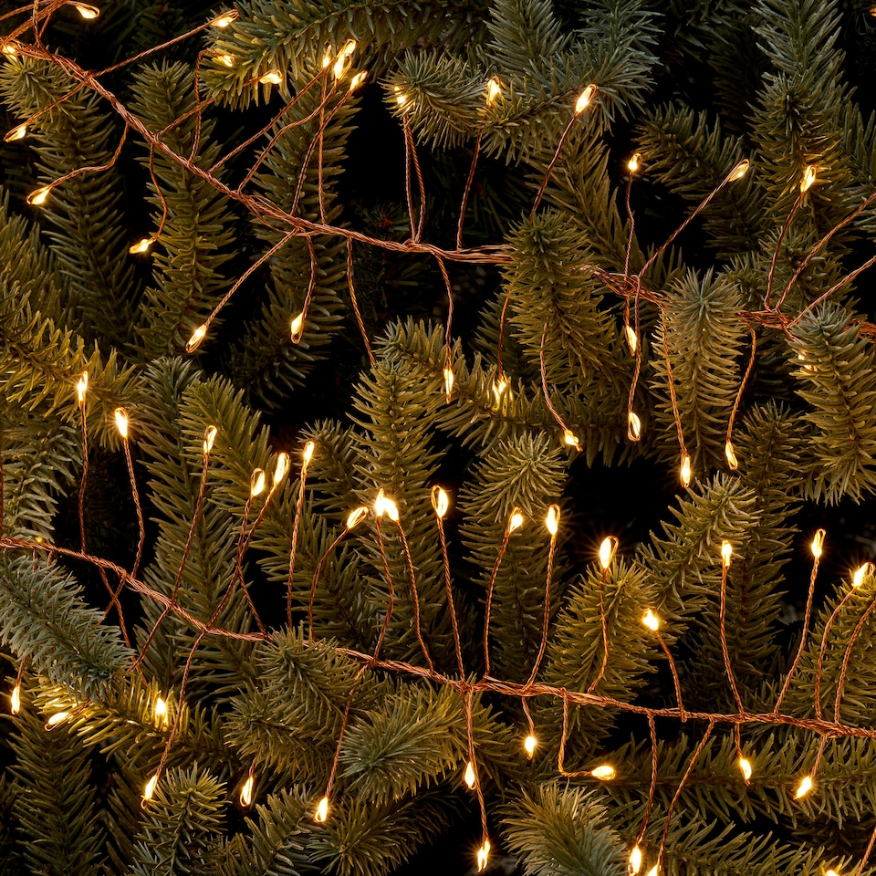 image 1 of Tesco 5.6M Warm White Copper Cluster Christmas Tree Lights