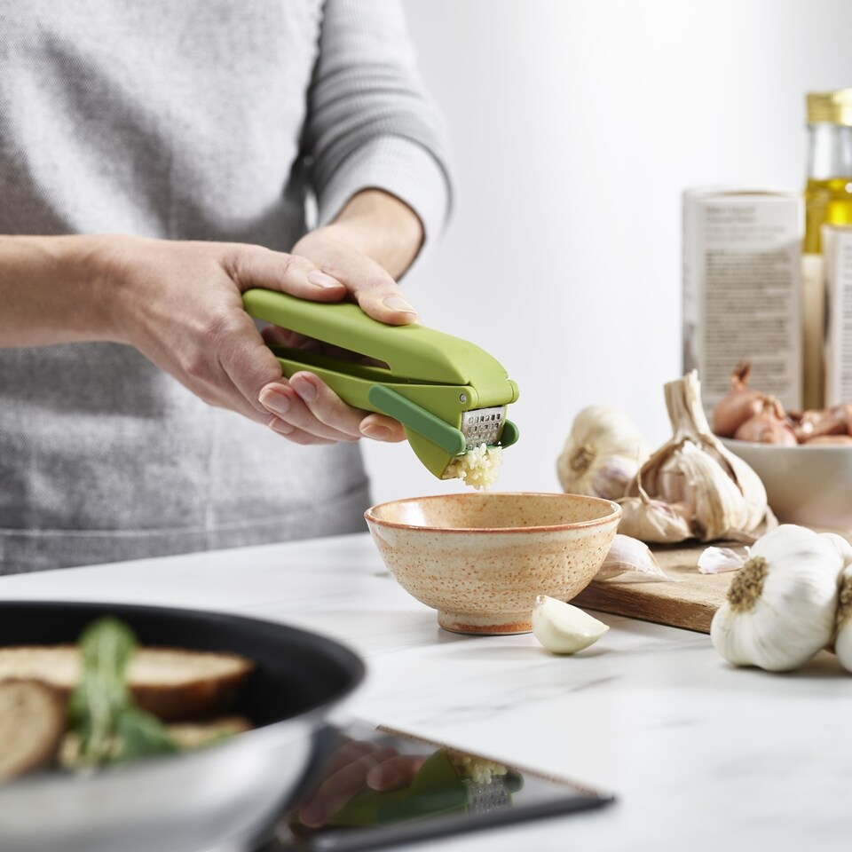 image 1 of Joseph Joseph Duo Easy Clean Garlic Press Green