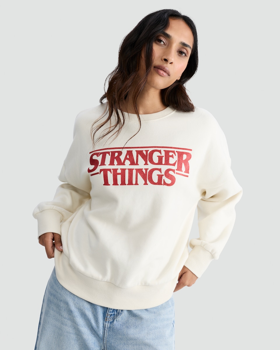 image 1 of Stranger Things Cotton Rich Slogan Sweatshirt in Cream